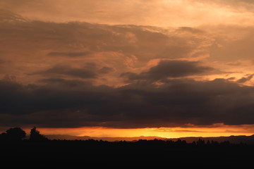 beautiful Golden sky with mountain before sunset
