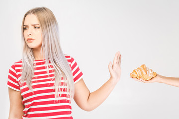Woman on dieting for good health concept. Woman doing sign no to refuse junk food or fast food that...