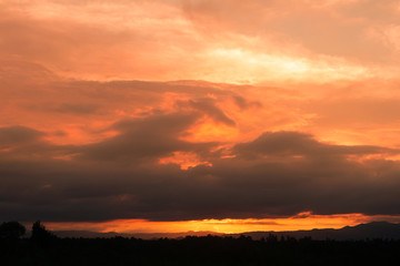 Fototapeta premium beautiful Golden sky with mountain before sunset 
