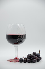 wine glass with grapes