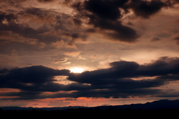beautiful Golden sky with mountain before sunset
