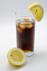 cold soda with ice and lemon