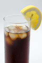 cold soda with ice and lemon