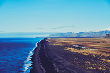 View from the heights to the shore with black sand in Iceland
