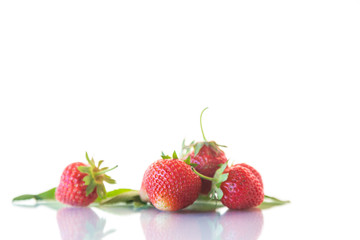 ripe red organic strawberry on a white