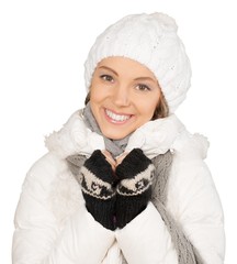 Portrait of beautiful young woman with make-up in winter clothes