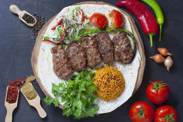 turkish food kofte stack of meatballs with pilav rice