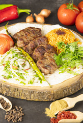 turkish food kofte stack of meatballs with pilav rice