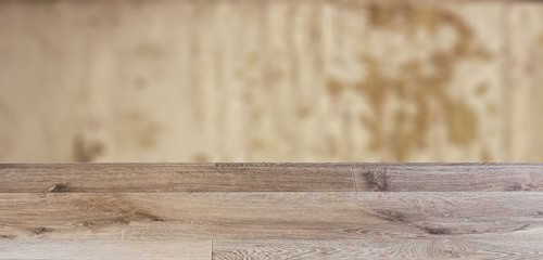 blank wooden table. Flooring. The texture of the cement wall. Mockup. Background