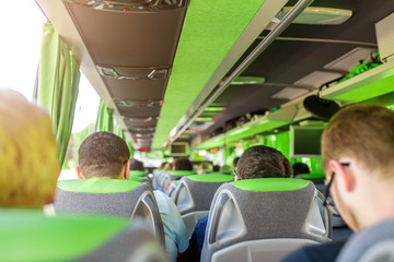 People traveling in intercity bus