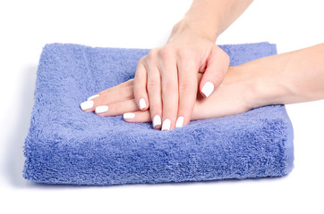 Towel female hands manicure on white background isolation