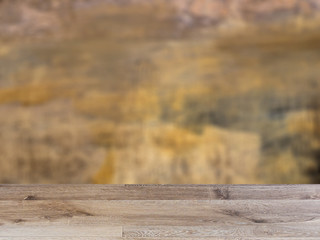 blank wooden table. Flooring. The wall of the old house. Cracks on the surface. Background