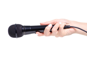 Microphone in hand on white background isolation