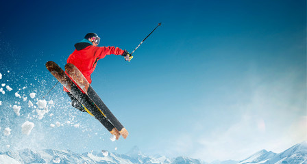 Skiing. Jumping skier. Extreme winter sports.