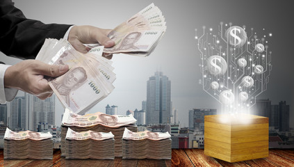 Investor trading cash money to digital currency concept