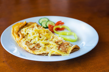 omelet with ham tomato and green salad