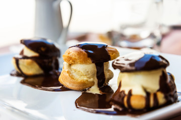 Profiteroles with chocolate sauce