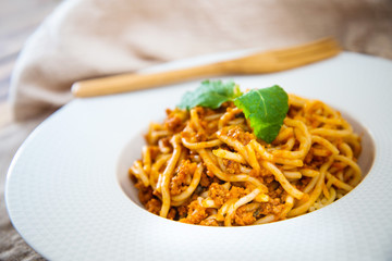 tasty pasta Italian meat sauce pasta on the table