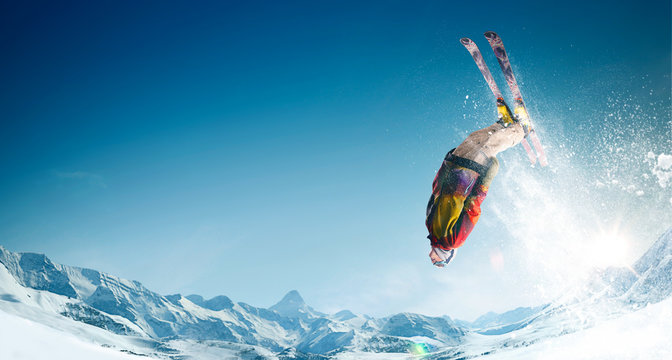 Skiing. Jumping skier. Extreme winter sports. © VIAR PRO studio
