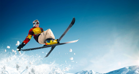 Skiing. Jumping skier. Extreme winter sports.