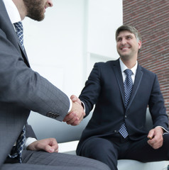 Handshake manager and attorney in the office