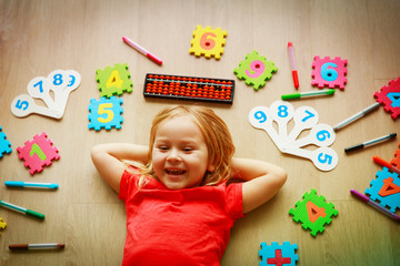 little girl learning numbers, mental arithmetic, abacus calculation