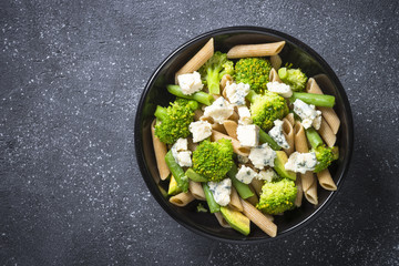 Whole-grain pasta penne with broccoli, avocado, green beans, pea