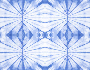 Seamless pattern, abstract tie dyed fabric of indigo color on white cotton. Hand painted fabrics. Shibori dyeing