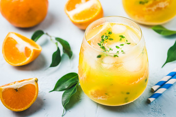 Summer refreshing citrus cocktail in glass. Selective focus, space for text.