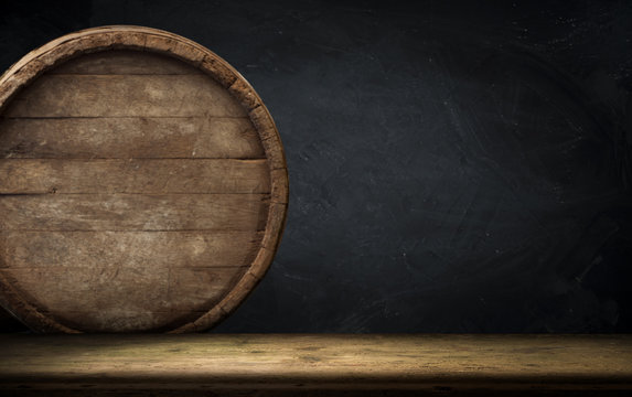 background of barrel and worn old table of wood