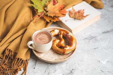 Tea Cup Hot Chocolate Coffee Autumn Time Bakery Pretzel Toned Photo Knitting Scarf Blanket Yellow Leaves Gray Background
