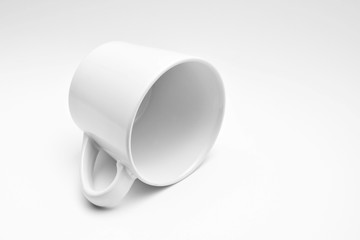 ceramic cup of coffee with shadow - monochrome