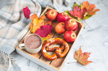 Tea Cup Hot Chocolate Coffee Autumn Time Bakery Pretzel Toned Photo Knitting Scarf Blanket Yellow Leaves Gray Background
