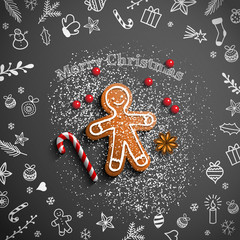 Gingerbread man with chalk doodles on black background