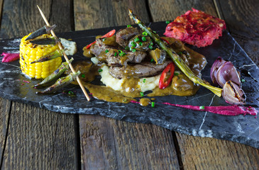 grilled meat on wooden back ground