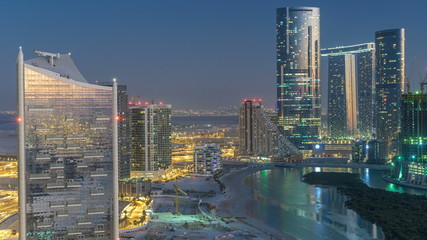 Buildings on Al Reem island in Abu Dhabi day to night timelapse from above. © HyperlapsePro