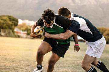 Men playing rugby - obrazy, fototapety, plakaty