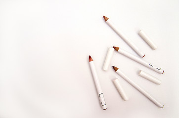 White pencils for lip makeup and beauty