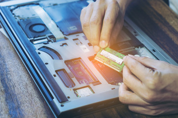 Selective focus Computer repair  and upgrade concept Close-up view. Workshop background