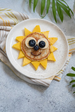 Funny Flower Pancake with berries for kids