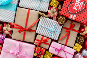 Obraz na płótnie Canvas Top view of Colored gift boxes with ribbons. Gifts for Christmas new year and birthday concept.