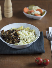 penne pasta on dark background