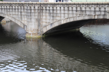 Scenery of designed vintage concrete bridge over the canal.