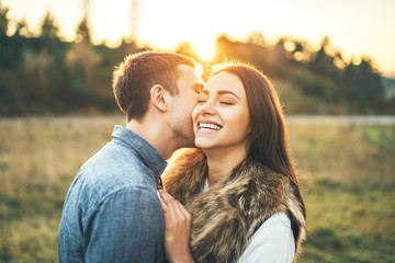 Fototapeta premium Happy couple in love relaxing in the field.