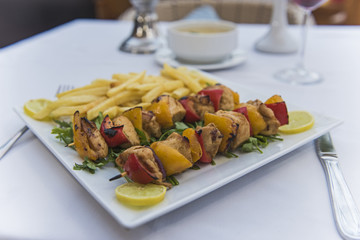 Luxury Shish Tawook chicken meal in outdoor restaurant