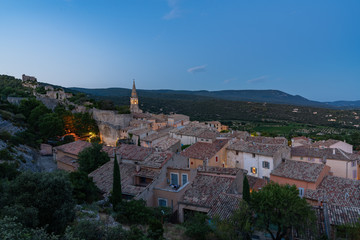 The medieval town Saint-Saturnin seen from above at nightfall, Provence, France