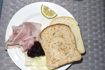 Bread, cheese, preserve and ham