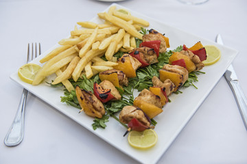 Luxury Shish Tawook chicken meal in outdoor restaurant