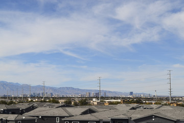 Fototapeta na wymiar Rooftops with blue sky in background 