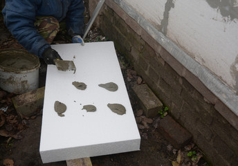 Fototapeta na wymiar External wall insulation. Foam Sheathing. Exterior wall styrofoam insulation.